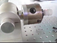 Nority Laser fiber marking machine rotary marking lighting lamp head.